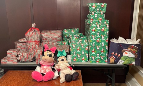 Eisenberg Rothweiler’s Christmas gifts for the family it “adopted” through the Support Center for Child Advocates