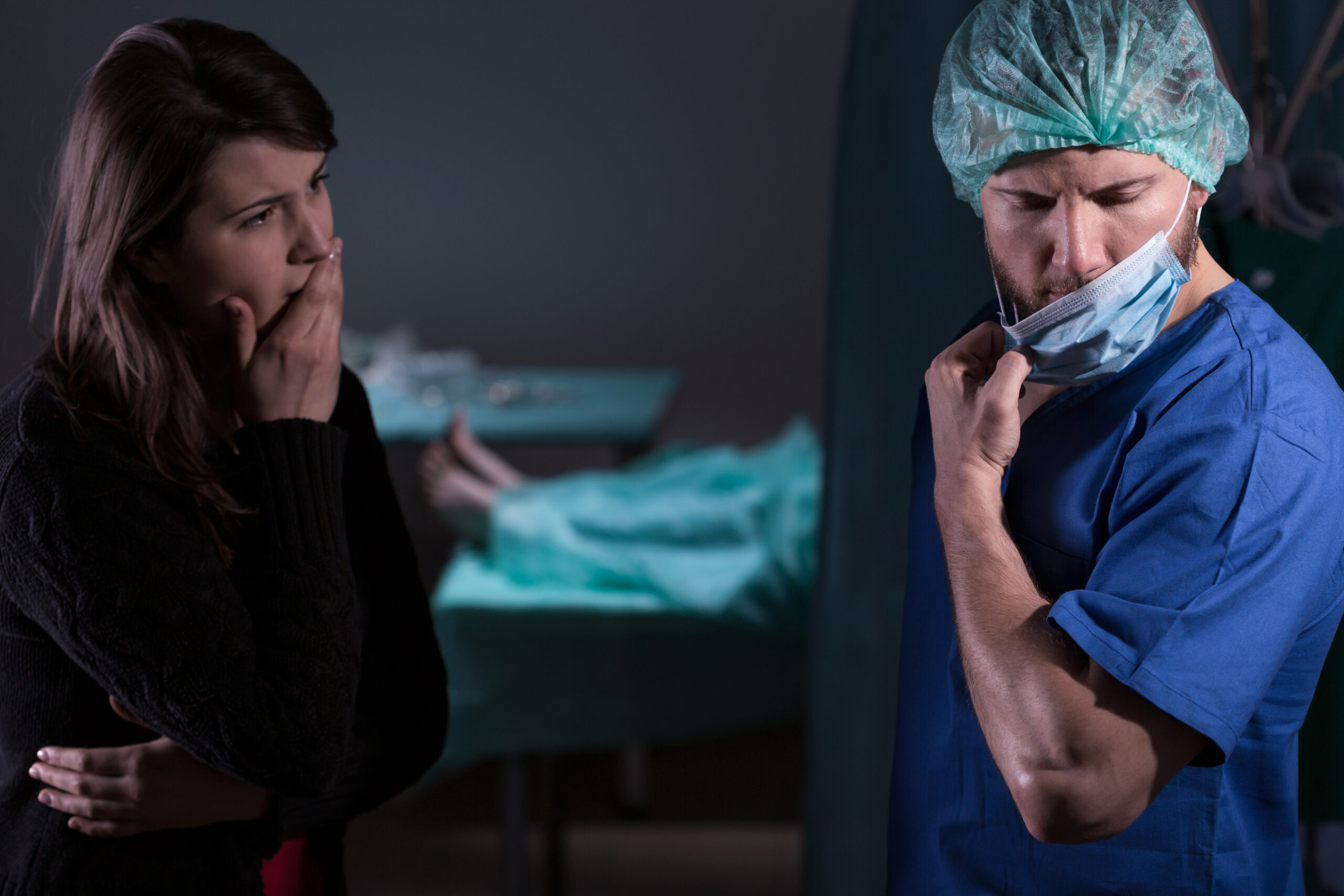 woman upset talking to doctor