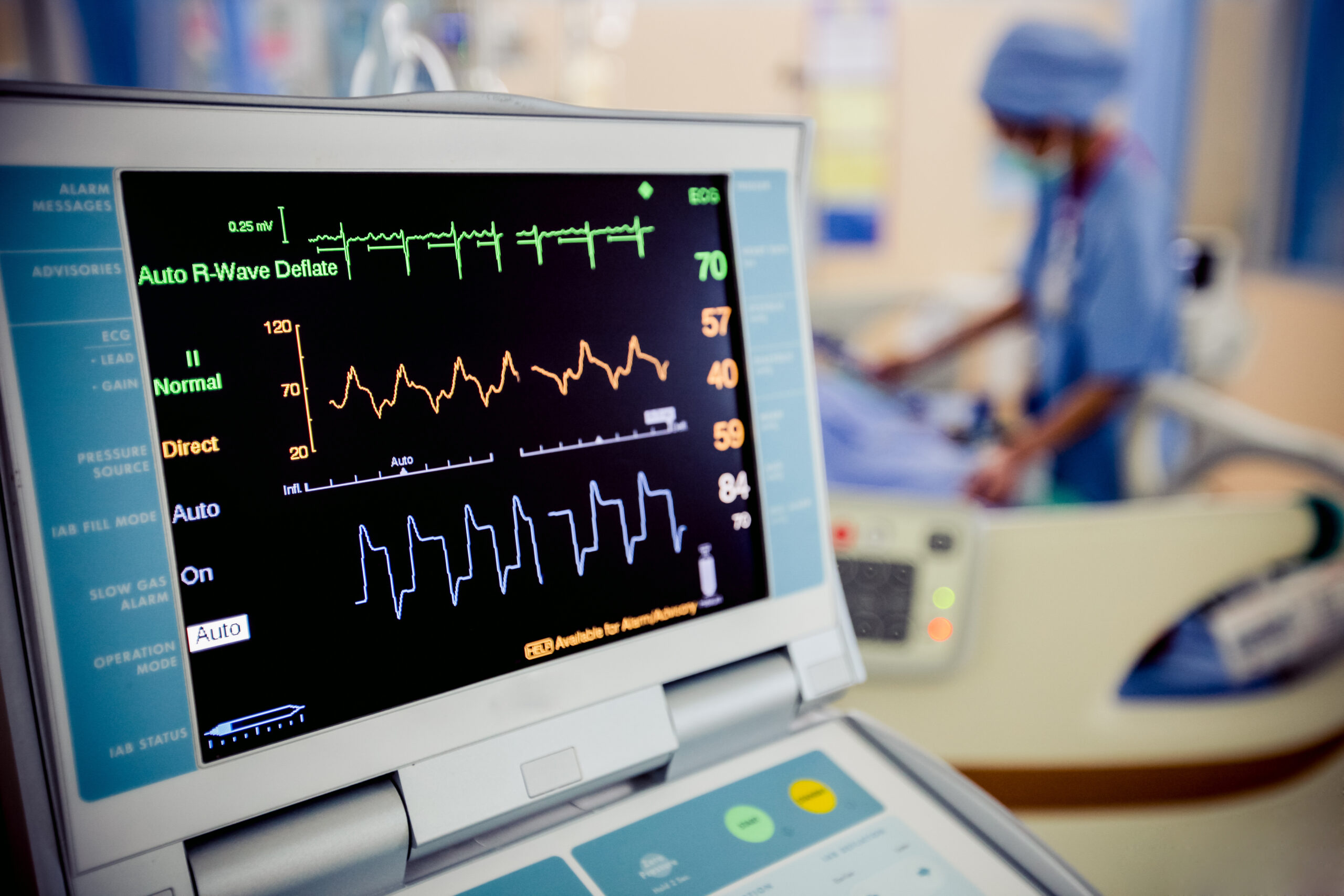 hospital monitor in patients room with attendant
